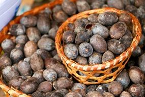 Tropical fruits in wicker baskets