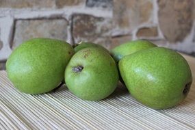 green pears on the table