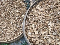 chopped dried mushrooms in bowls