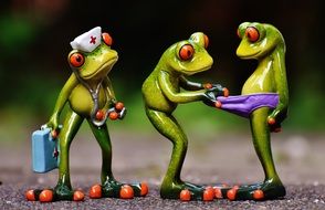 frogs figures in an emergency close up