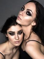 photo of beautiful girls with dark makeup