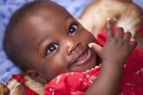 cheerful black child closeup
