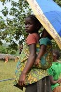 Young girl with the little sister in the Africa