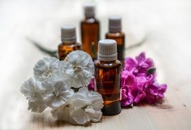 essential oils with flowers close-up