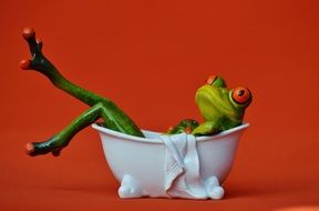 frog in a white bath on a bright background