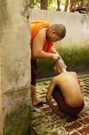 buddhist monk shaving