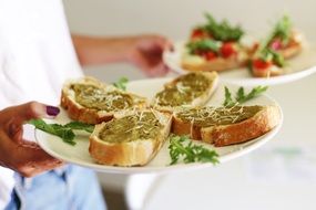 Italian sandwiches are on a plates