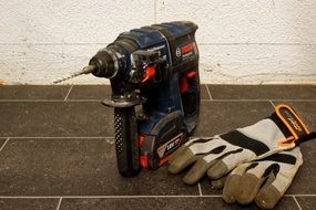 cordless drill and savety gloves