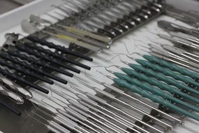 many dental instruments close up