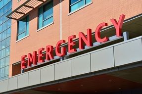 emergency sign on the facade of the hospital