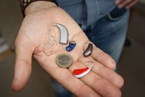 euro coin and hearing aids