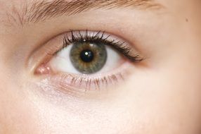 young woman with green eyes