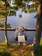 rower on a boat on the river