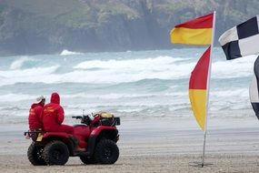 lifeguards on a raging beach