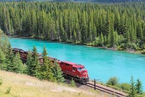 train on the railway near the river