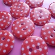 red buttons with white dots