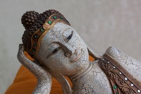 sculpture of a resting buddha