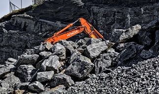 bulldozer clears stone blockage