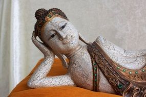 statue of supported Buddha