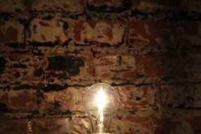 Light of the light bulb on the wall