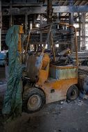 old yellow loader in the workshop