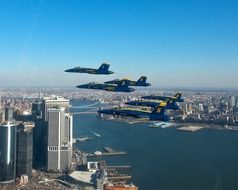 blue angels flying over the city