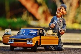 Smal model of automotive and human