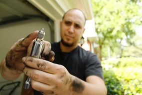 Man with spark plug