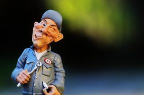 figure of the master with a grimace