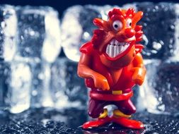 ugly human figure, Red toy at blue background