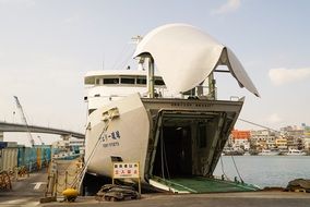 cargo Ship with open hold in port