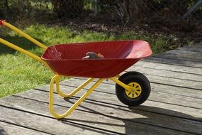 garden cart on a wooden platform