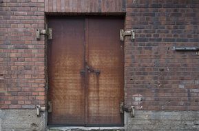 wooden door of a brick factory