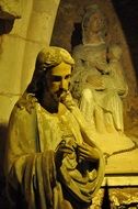 aged stone Statues of Jesus Christ and the virgin and child in church