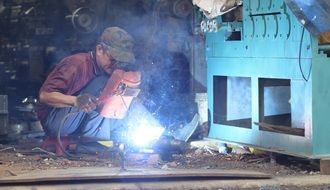 male welder in a factory