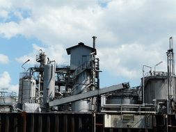 industrial plant, equipment at cloudy sky