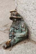 brass gnome monument in poland