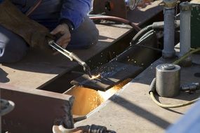 welder works in a locksmith workshop