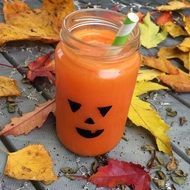 orange juice in a decorative jar for halloween