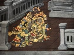 colorful murals in a large Thai palace