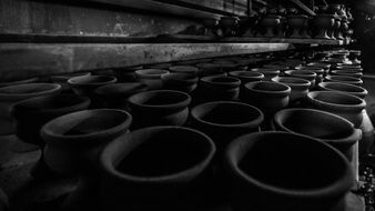 stored pottery in black and white