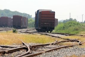 Trains with boxcars on the rail road