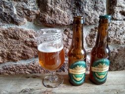 Natural Craft Beer in glass and bottles