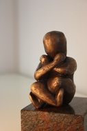 figure of a man made of brass