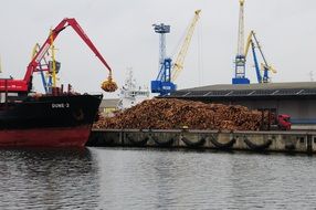wooden beam cranes in a port
