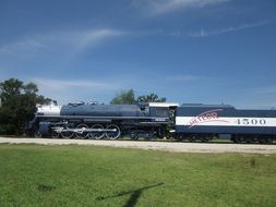 view of a freight train on a sunny day