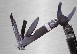 Phillips multitool knife with screwdriver