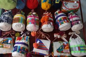 multicolored handmade bags in the market