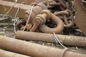 rusty chain and pipe closeup