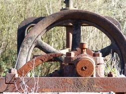 rusty wheel on the well